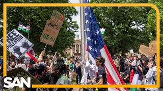 Video of fraternity brothers guarding US flag highlights campus political divide
