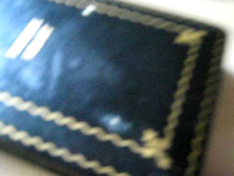 World War II- Authentic Artifacts: Coins, Purple Heart, Star Of David