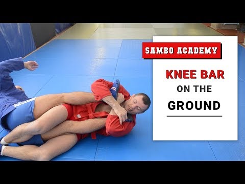 Knee bar. How to roll correctly when you're down and opponent stands
