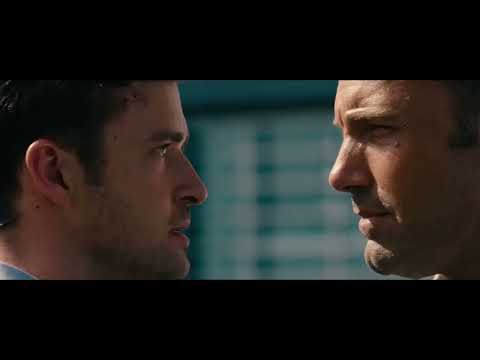 Trailer collage — club lights, yacht deck, stacks of cash and FBI files, cut to pounding score hits