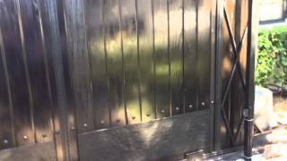 Spanish style gate, wood gate by mulholland security
