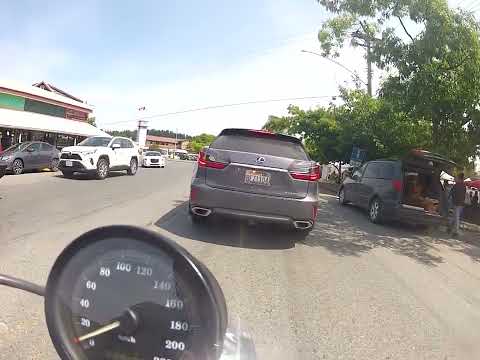 Riding through tourist filled Ganges on Salt Spring Island