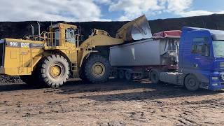 Caterpillar 990 Wheel Loader Loading Coal On Lorries With Three Passes - S.G.M Melidis