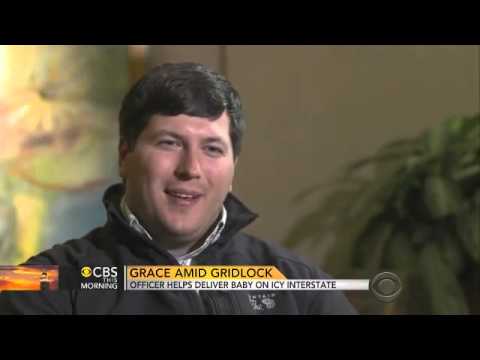 Officer helps deliver baby born on Atlanta highway during snow-caused traffic jam