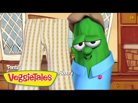 Green VeggieTales character in a blue shirt and brown hat looks at a tall pair of striped pants in a cozy kitchen; VeggieTales logo is visible in the corner.