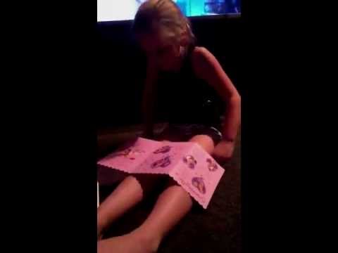 Little girl gets panties for birthday.