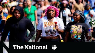 Buffalo tries to come to grips with mass shooting as victims are identified