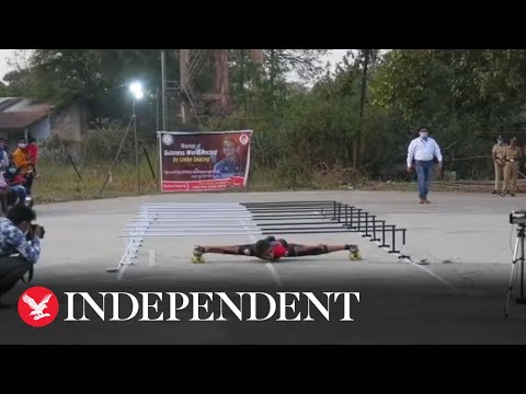 Teenager breaks world record for quickest 'limbo skate'