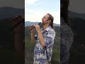 Mountain meditation. Andrei Krylov plays flute in Mexico Mountains near ruins of Pagan Temple