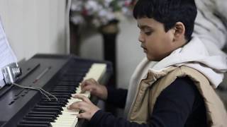 Christmas song on Piano Silent Night by 6 years old kid || Latest updates 2018