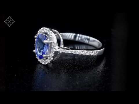 UT42 - Tanzanite 7 x 5mm And 0.30ct Diamond 18K White Gold Ring