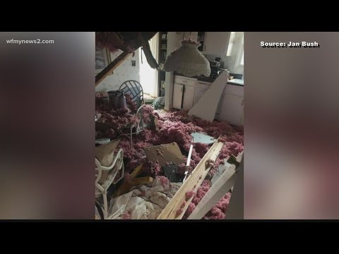 Ice storm topples trees and power poles onto homes