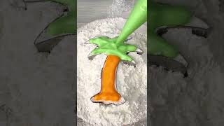 Creating a palm tree out of marshmallow creme 🌴🍥 - A fun DIY you’ll love! 🎥✨