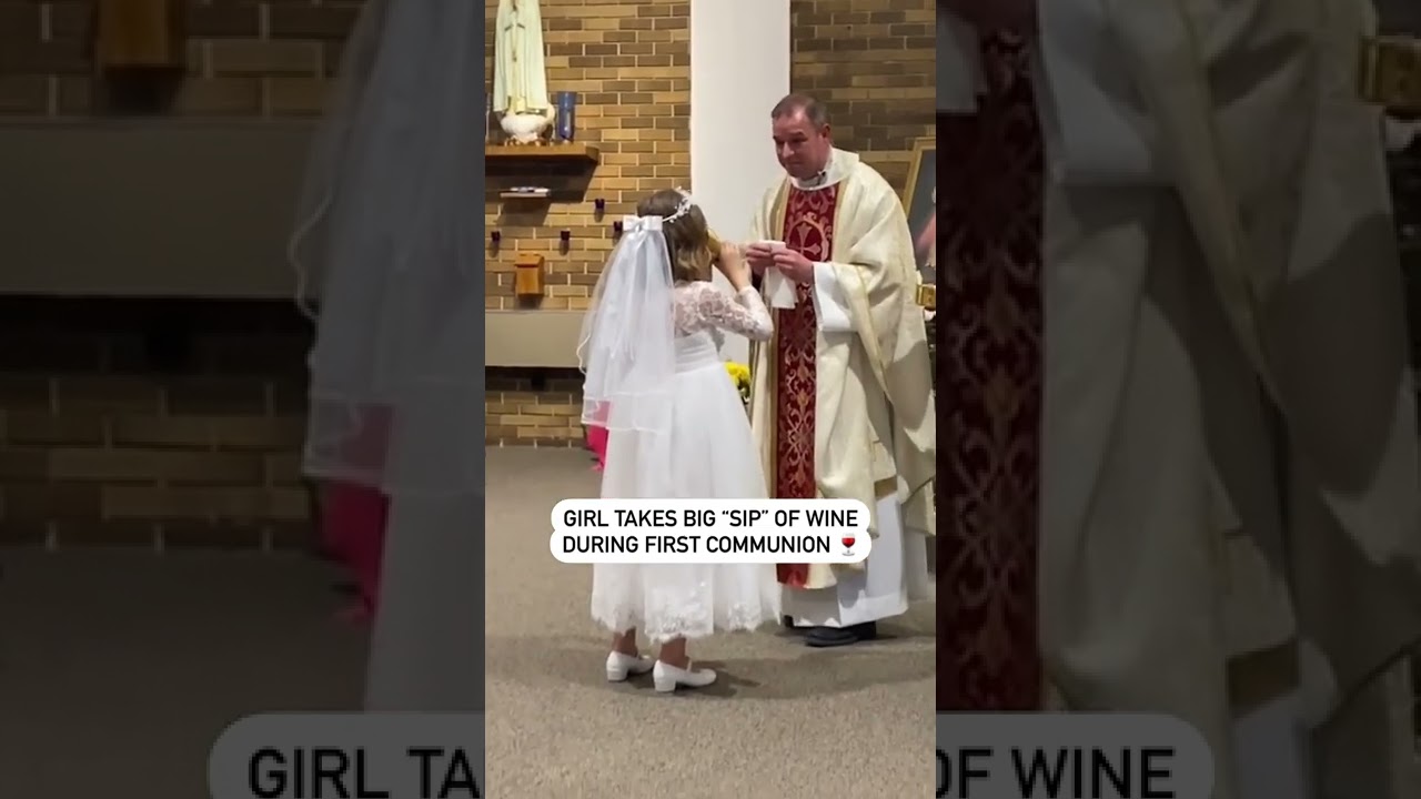 GIRL TAKES BIG 'SIP' OF WINE DURING FIRST COMMUNION 😆