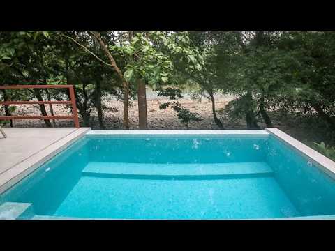 0.2 ACRES - 2 Bedroom Brand New Home With Pool On Baru River Walk/Bike To Dominical!!!