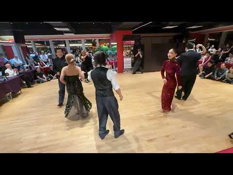  Leandro Capparelli,    Jeannette Erazú,    London Hong,    Solange Jung,    Raymond Chu,    Lily Cheng,    Gustavo Lin,    and  Vivien Ye  are  dancing  to  the  tango  "  Corazon  "  by  Carlos di Sarli  in  2026