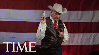 Roy Moore Pulls Gun Out On Stage During Alabama Rally Before Republican Senate Primary | TIME