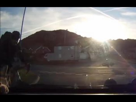 Cyclist Crashes into Car UK Dash Cam Footage
