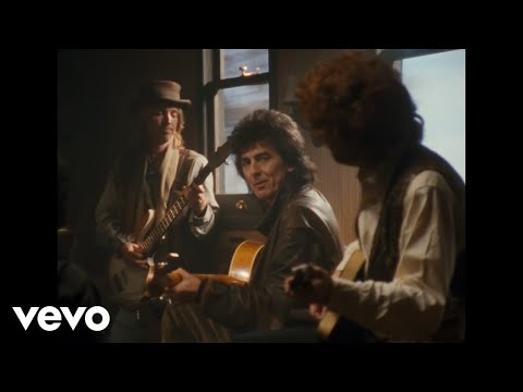 The Traveling Wilburys - End Of The Line (Official Video)