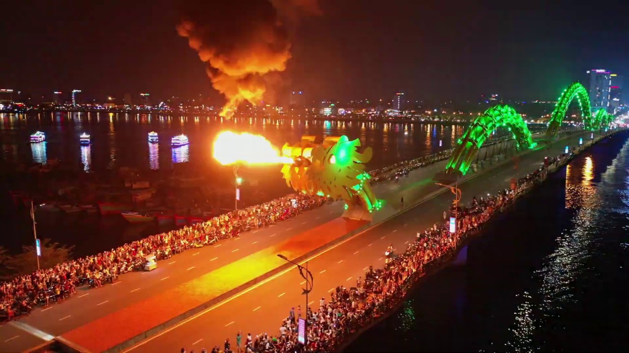 Experience the mesmerizing spectacle of Dragon Bridge Fire Show from a bird's eye perspective.