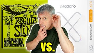 Ernie Ball Slinky vs D’Addario XS – Which Guitar Strings Sou