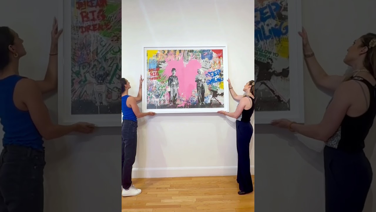 Hanging an iconic #MrBrainwash in our #Boston gallery .. see works like ‘Juxtapose’ here with us!💅