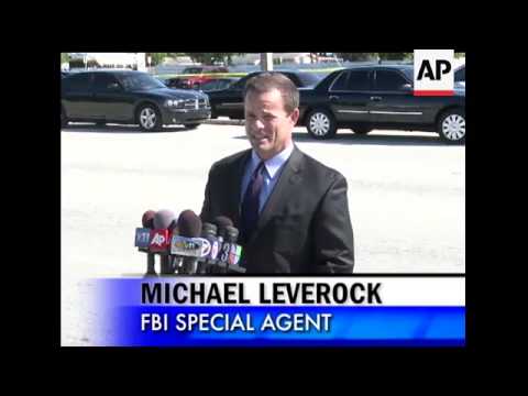 Authorities say a Brinks armored truck security guard was fatally shot Friday during a robbery outsi