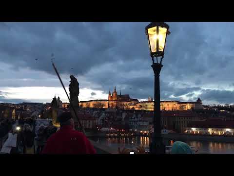 Lamplighter (lampář) on the Charles Bridge, Prague