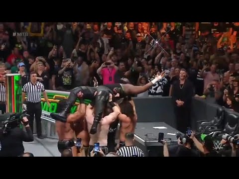 6 Man gives there Finishers to Omos in MITB 2022