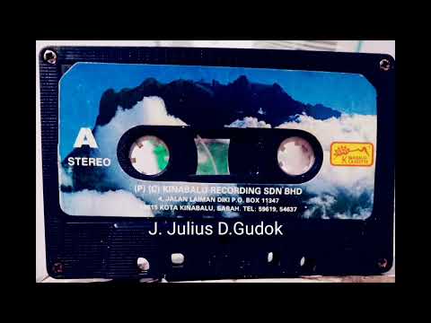 Koupusan Om Ginowoon Ku J.Julius D.Gudok