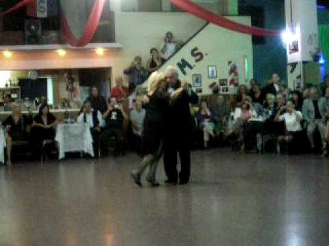 Carlos Perez  and  Rosa Forte  are  dancing  to  the  tango  "  Café Domínguez  "