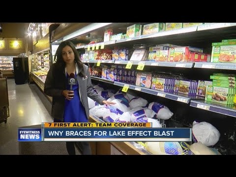 Shoppers stocking up before snow and Thanksgiving