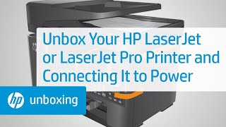 Розпакування та підключення принтера HP LaserJet до джерела живлення