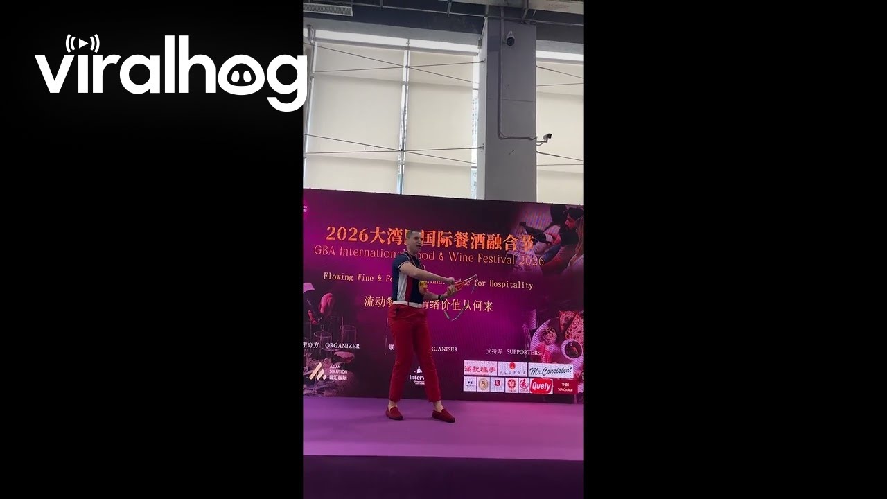 Pants Rip During Live Sabrage Presentation || ViralHog