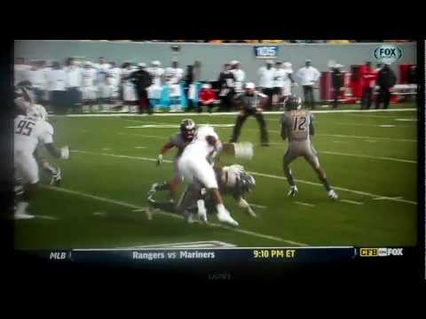 Geno Smith hangs in while getting hit