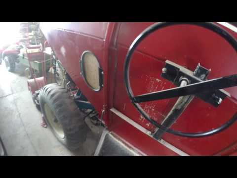 Refueling the Corn Burner With Corn and Wood Pellets