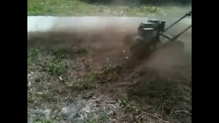 preview picture of video 'TIGER TILLER on a PUSH Mower - Let the dust FLY!!'