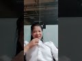 Playful Chinese Girl Looks Down Her Blouse