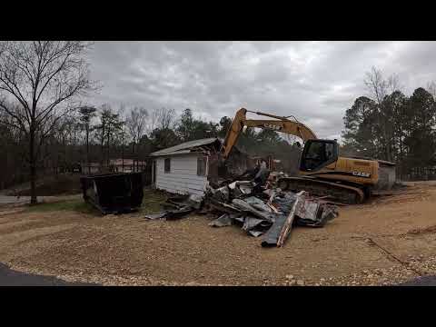 Tearing down little house on the hill 