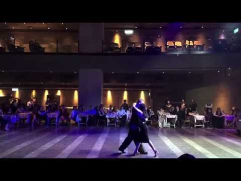  Sergiy Podbolotnyy  and  Anna Chin  are  dancing  to  "  Junto A Tu Corazon  "  by  Carlos di Sarli  at  Taipei Tango Festival  in  2016
