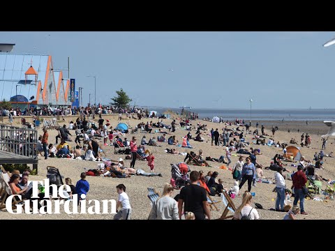 People flock to English beaches as coronavirus lockdown eases