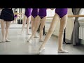 Slim Girls Legs In Tights Are Doing Battement Tendu During Ballet Lesson With Experienced Female