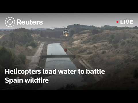 Video Thumbnail: LIVE: Helicopters load water to battle wildfire in Spain's northern Aragon region