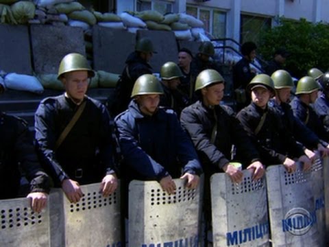 Pro-Russian separatists, Ukrainian government battle for control of towns