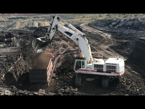 Caterpillar 385C Excavator Loading Coal On Trucks - Interkat SA