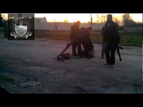 تجهيز كتيبة سعد بن عبادة الخزرجي صاروخ محلي الصنع لإطلاقه على إدارة الدفاع الجوي في بلدة المليحة في ريف دمشق