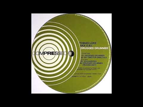 Tobias Lueke AKA O.B.I. - Drugged Drummer (Techno Edit) (B2) [COM041-6]