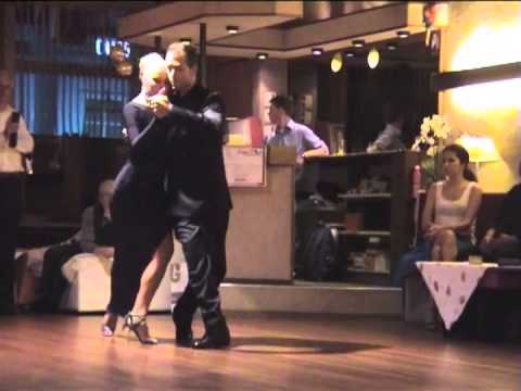  Michael Nadtochi  and  Eleonora Kalganova  are  dancing  to  the  tango  "  Naranjo En Flor  "