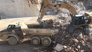 Caterpillar 349D Excavator Loading on Cat 730 Articulated Haul Truck