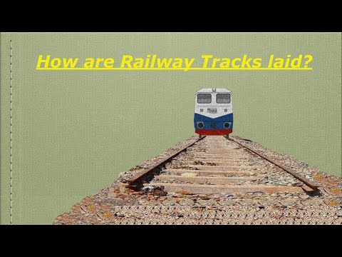 How are train tracks laid?